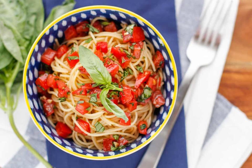 Unsophisticook<p>A perfectly refreshing pasta meal that you can make at home with few simple ingredients. And it will taste like the Olive Garden dish!</p><p><strong>Get the recipe: <a href="https://unsophisticook.com/capellini-pomodoro/" rel="sponsored" target="_blank" data-ylk="slk:Copycat Olive Garden Capellini Pomodoro Recipe;elm:context_link;itc:0;sec:content-canvas" class="link ">Copycat Olive Garden Capellini Pomodoro Recipe</a></strong></p>