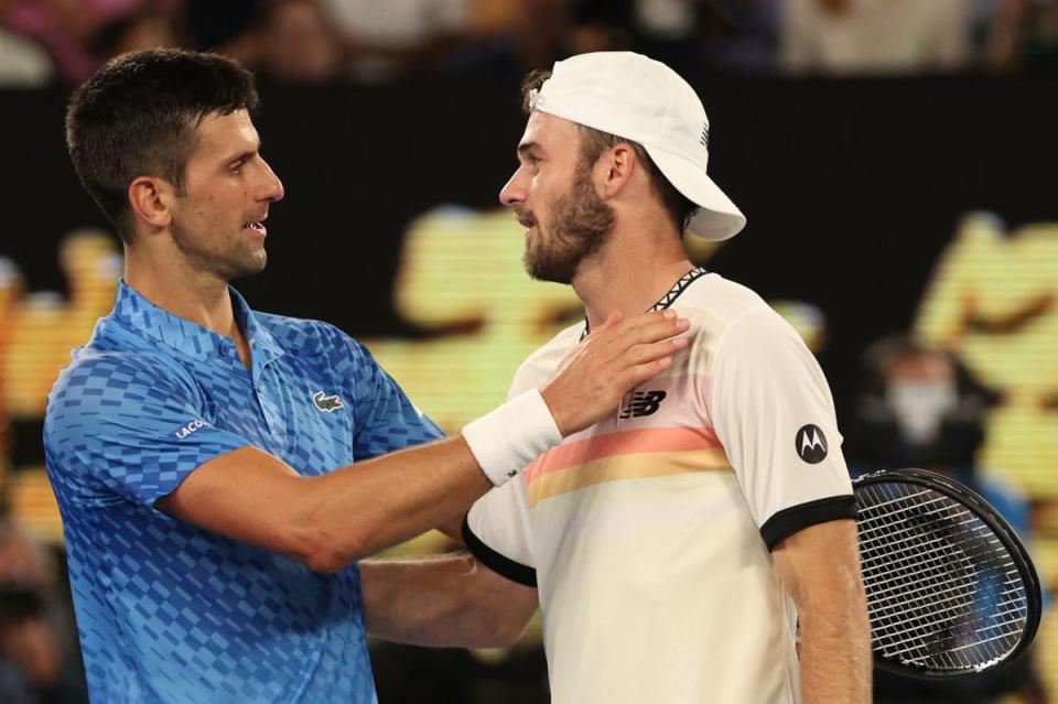 Djokovic greets Paul at the net (Getty Images)