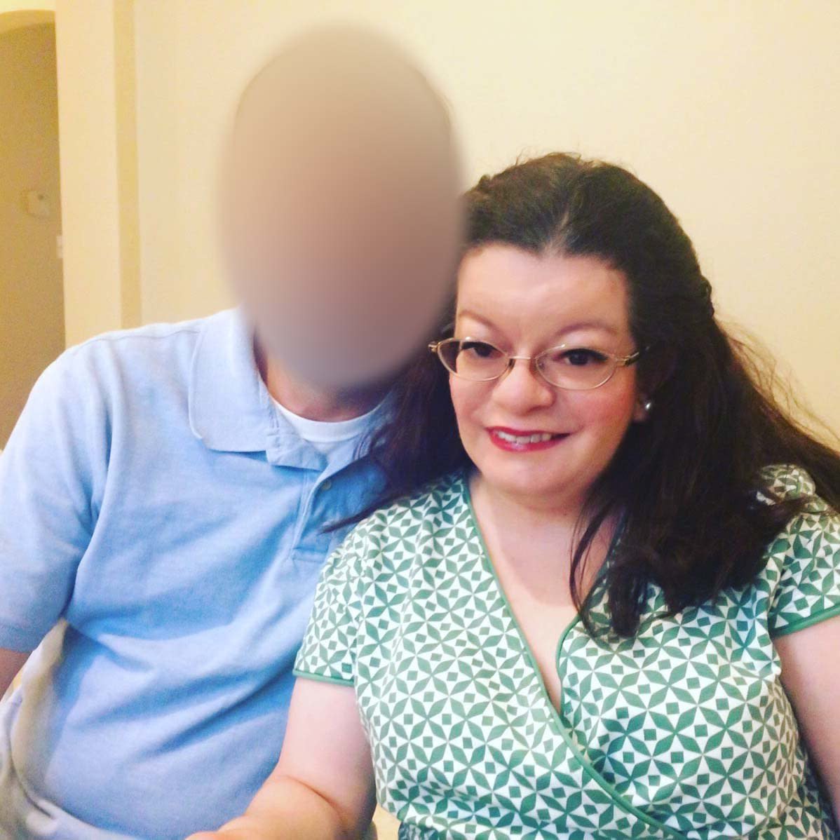 Amanda Auchter and her husband, who has been an FAA employee for 20 years. His face is blurred to protect his identity for fear of agency retribution or loss of his job. (Photo: Courtesy of Amanda Auchter)