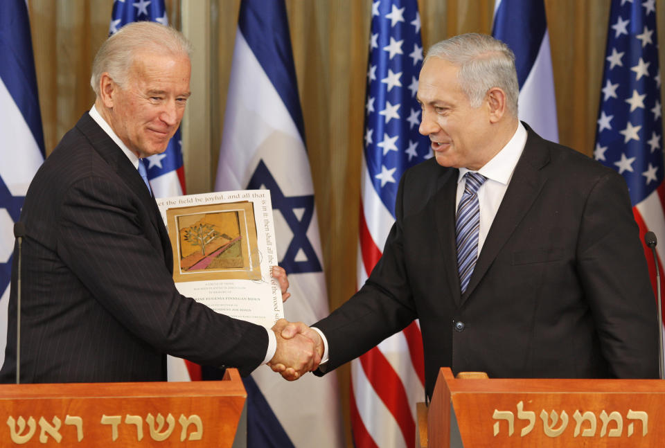 FILE - In this March 9, 2010, file photo, then-U.S Vice President Joe Biden shakes hand with Israel's Prime Minister Benjamin Netanyahu at the Prime Ministers residence in Jerusalem. (AP Photo/Ariel Schalit, File)