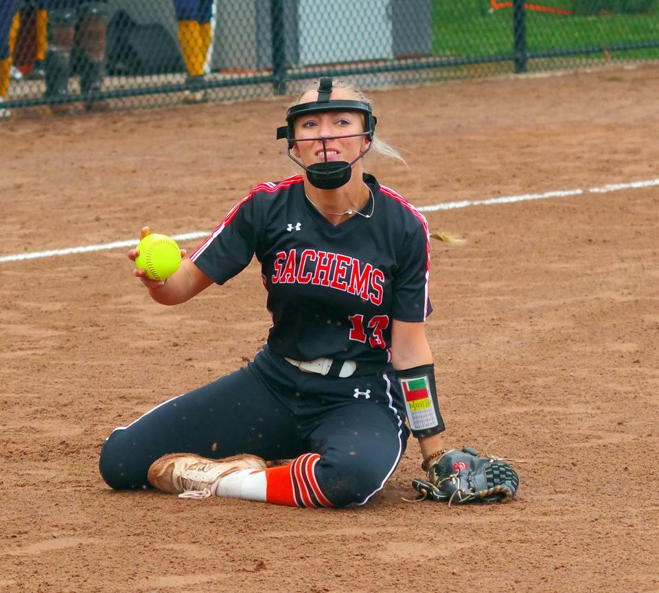 Middleboro pitcher Cassidy Machado pitched a good game but lost her footing while trying to shag this short ground ball. She was able to make the throw but not in time. However, she was able to shut down this Hanover threat without any runs coming in from the Hawks on Monday, June 5, 2023.