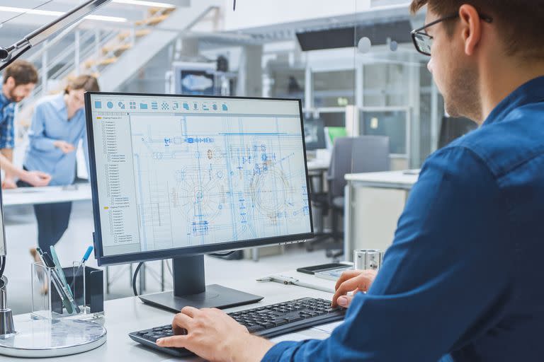 Sobre la Captura de Hombro de Ingeniero Trabajando con Software CAD en Computadora de Escritorio, la Pantalla Muestra Borradores y Dibujos Técnicos. En segundo plano, el Servicio de Ingeniería Especializado en Diseño Industrial
arquitectos arquitecto ingeniero exportacion de tecnologia
2021
foto SHUTTERSTOCK