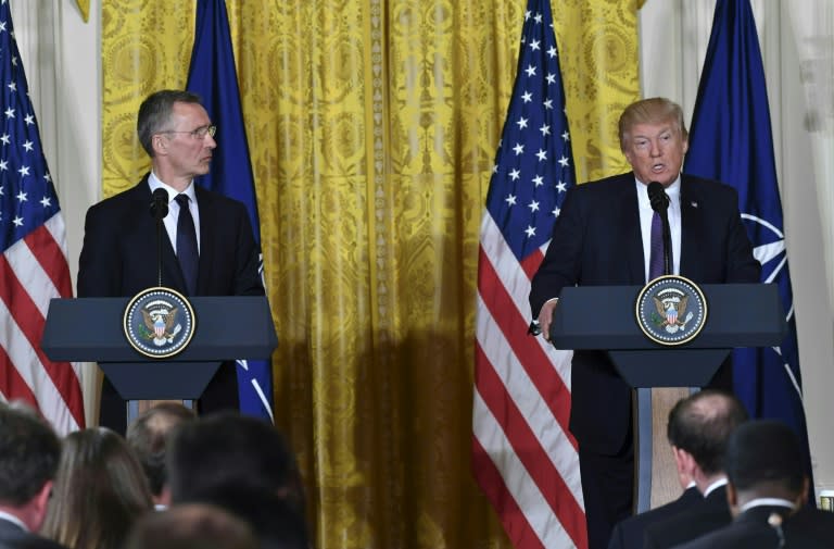 US President Donald Trump and NATO Secretary General Jens Stoltenberg (L) hold a joint press conference in the East Room at the White House in Washington, DC, on April 12, 2017