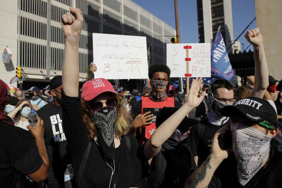 Protesters demonstrate outside the BOK Center where President Trump will hold a campaign rally in Tulsa, Okla., Saturday, June 20, 2020. (AP Photo/Charlie Riedel)