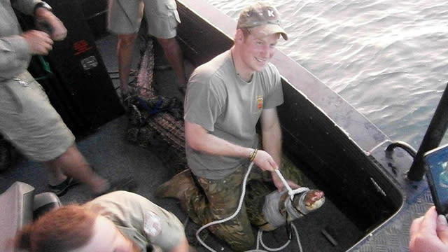 How very Prince Harry of him! Prince Harry helped catch a saltwater crocodile in Darwin Harbour during his visit to Australia last month, straddling the 10-foot reptile and managing to look at ease the entire time. Australia's Parks and Wildlife Commission Northern Territory recently shared the photos of his epic adventure down under, which was reportedly a "top secret mission." Australia Parks and Wildlife Commission Northern Territory Australia Parks and Wildlife Commission Northern Territory PHOTOS: 9 Times Prince Harry Proved He's the Prince of Fun Wildlife ranger Erin Britton said the prince would make "a great croc catcher" and that he did a "great job" helping the crocodile management team, the <em>BBC</em> reports. According to the British news organization, rangers in the Northern Territory remove crocodiles from waterways used for boating and fishing to limit the risk of fatalities and injuries. They're then taken to crocodile farms or killed. The 30-year-old royal continues to charm during his recent tour of different countries. During a visit with locals in New Zealand last Friday, the handsome bachelor shared a sweet moment with a "a little Cinderella." VIDEO: Prince Harry -- 'I Would Love to Have Kids Right Now' Watch the video below for more on the adorable moment!