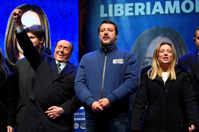 FILE PHOTO: Former Italian Prime Minister and leader of the Forza Italia party Silvio Berlusconi, Brothers of Italy party leader Giorgia Meloni and League party leader Matteo Salvini attend a rally ahead of a regional election in Emilia-Romagna, in Ravenna