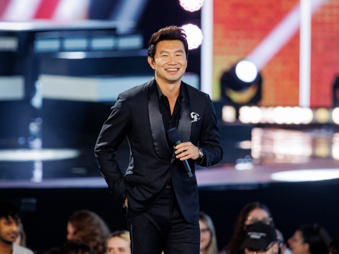 Actor Simu Liu put his Marvel gear aside to host the 51st Juno Awards in his hometown of Toronto on Sunday. It's the first in-person show celebrating Canadian music since 2019 following pandemic pauses.  (Evan Mitsui/CBC - image credit)