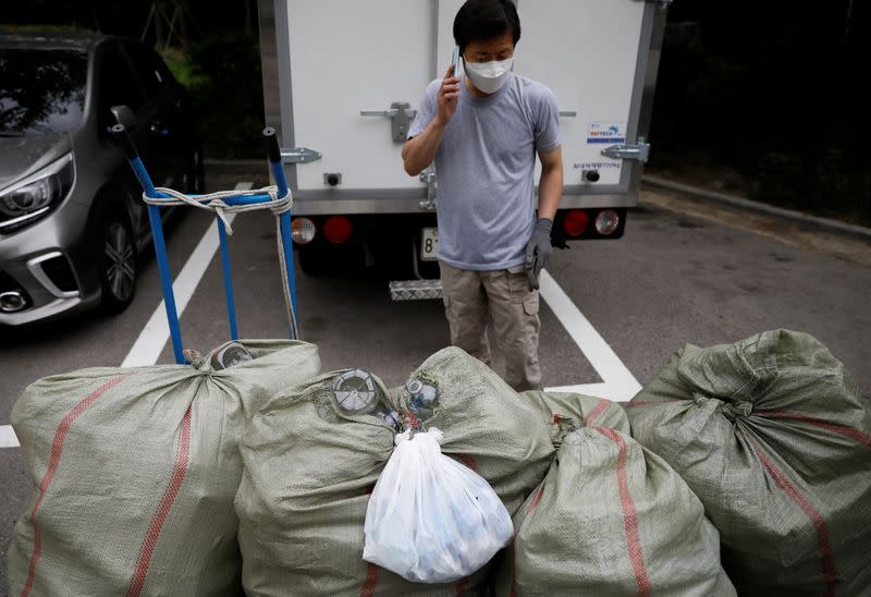 North Korean defector group prepares plastic bottles filled with rice and masks to be sent towards North Korea