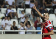 Russia's Denis Cheryshev celebrates after scoring his side's fifth goal during the Euro 2020 group I qualifying soccer match between Cyprus and Russia at GSP stadium in Nicosia, Cyprus, Sunday, Oct. 13, 2019. (AP Photo/Petros Karadjias)