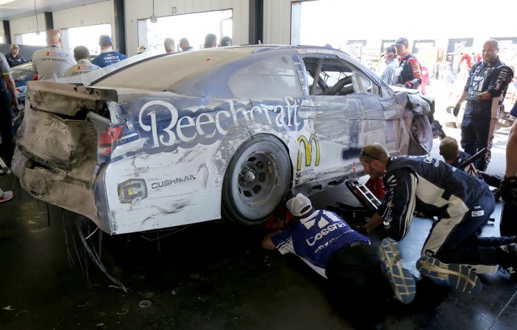 Jamie McMurray’s scorched car in the garage. (Getty)