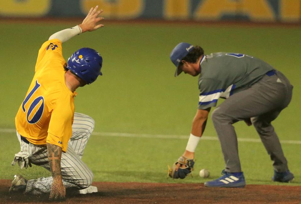 Angelo State University's Justin Lee slides safely into second base during Game 4 of the NCAA D-II South Central Regional against Texas A&M-Kingsville at Foster Field at 1st Community Credit Union Stadium on Friday, May 20, 2022.