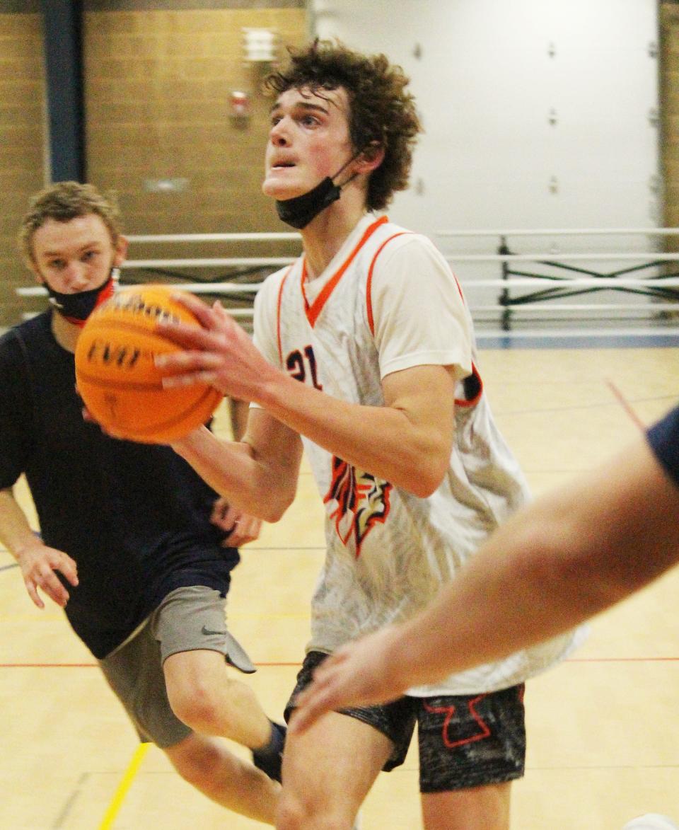 Pontiac sophomore Riley Weber drives to the basket during practice Tuesday at the Rec-Center.