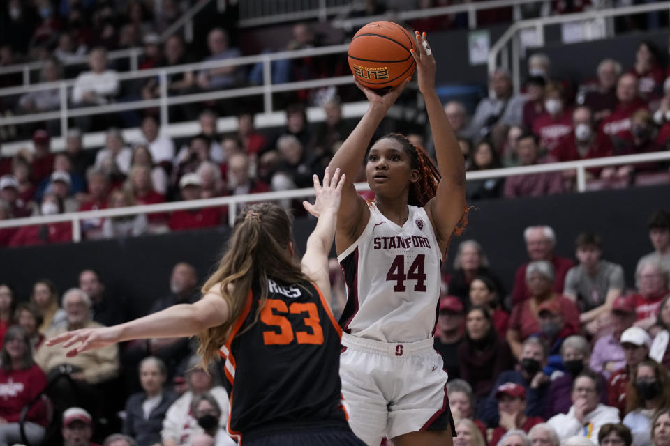 Stanford forward Kiki Iriafen (44) shoots a 3-point basket over Oregon State forward Kelsey Rees (53) during the second half of an NCAA college basketball game, Sunday, Jan. 21, 2024, in Stanford, Calif. (AP Photo/Godofredo A. Vásquez)