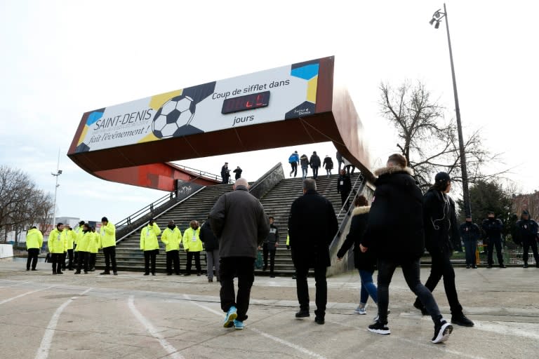 Stewards stand at the stadium entrance before the Six Nations international rugby union match between France and Italy at the Stade de France in Saint-Denis, north of Paris, on February 6, 2016