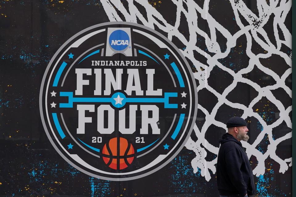 The Final Four logo for the NCAA men's tournament is painted on a window in downtown Indianapolis.