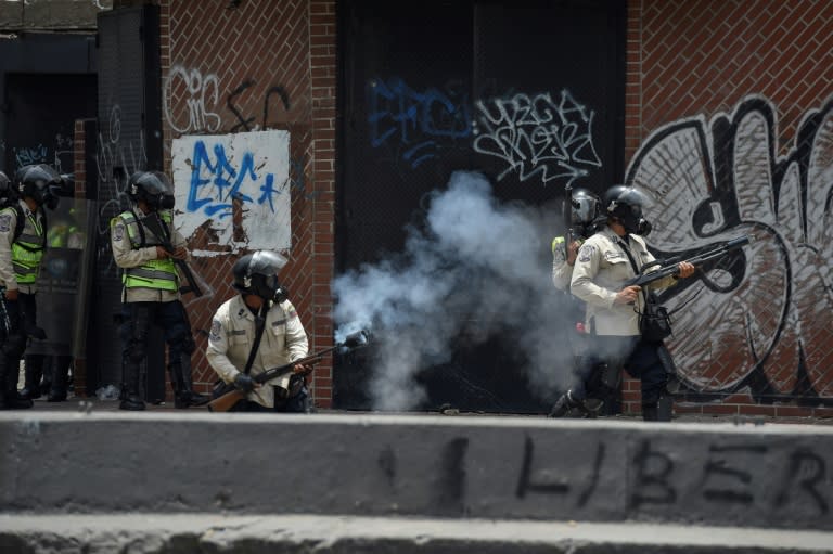 Riot police had deployed in force ahead of Wednesday's mass demonstrations in Caracas