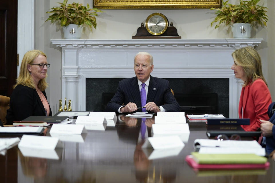 President Joe Biden speaks during a meeting with FEMA Administrator Deanne Criswell, left, and Homeland Security Adviser and Deputy National Security Adviser Elizabeth Sherwood-Randall, right, in the Roosevelt Room of the White House, Tuesday, June 22, 2021, in Washington. (AP Photo/Evan Vucci)