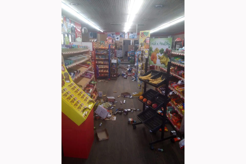 Various items litter the floor of the 4 Brothers Store in Sparta, N.C. after an earthquake shook much of North Carolina early Sunday, Aug. 9, 2020. (Michael Hull via AP)