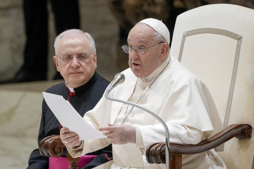 Pope Francis, front, delivers his speech during his weekly general audience in the Pope Paul VI hall at the Vatican, Wednesday, Jan. 31, 2024. (AP Photo/Andrew Medichini)