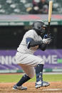 New York Yankees' Rougned Odor watches his two-run single in the seventh inning of a baseball game against the Cleveland Indians, Thursday, April 22, 2021, in Cleveland. (AP Photo/Tony Dejak)