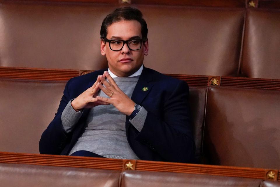 Rep. George Santos, R-N.Y., waits for the start of a session in the House chamber as the House meets for the fourth day to elect a speaker and convene the 118th Congress in Washington, Friday, Jan. 6, 2023. (AP Photo/Alex Brandon) ORG XMIT: DCAB169