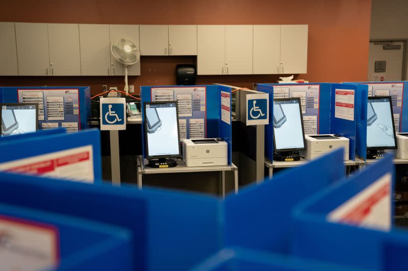 Wheelchair-accessible voting machines are seen inside a polling station at the South Region Live Well Center in Chula Vista