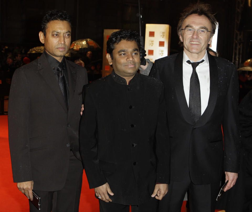 **FILE** This Feb.8, 2009 file photo shows Indian actor Irrfan Khan, left, Indian composer A. R. Rahman, center, and British director Danny Boyle, right, arrive at the British Academy Film Awards 2009 at The Royal Opera House in London, England. (AP Photo/Joel Ryan,File)