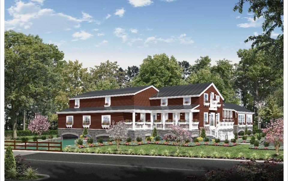 Rendering of design for building to replace hardware store on East Allendale Road in Saddle River shows structure will be raised seven feet, with arched raceways (left) to allow water to flow under the building without affecting its structure.