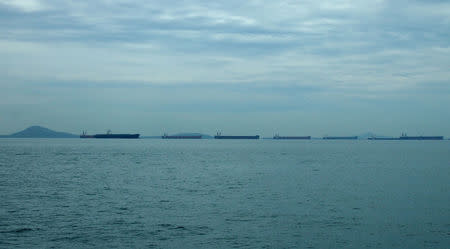 FILE PHOTO - Tankers in the Strait of Singapore May 22, 2016. REUTERS/Henning Gloystein/File Photo