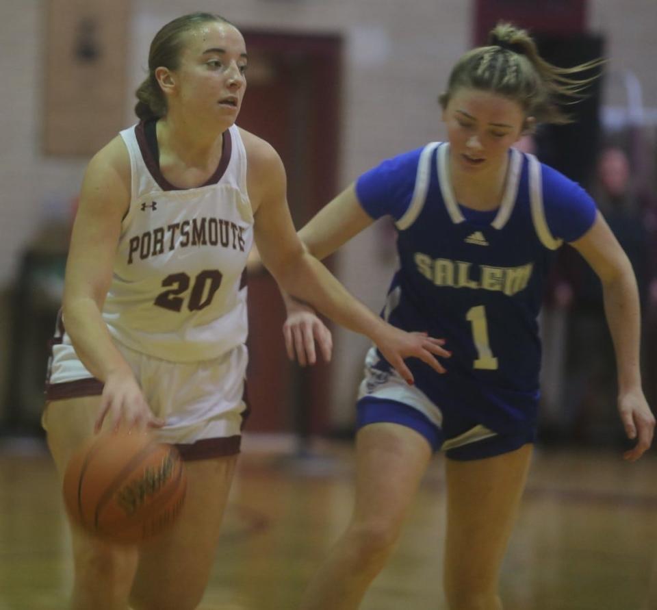 Portsmouth High School's Sydney Pettis brings the ball up the court ahead of Salem's Olivia Defrancesco during Friday's 54-32 Division I win at Stone Gymnasium.