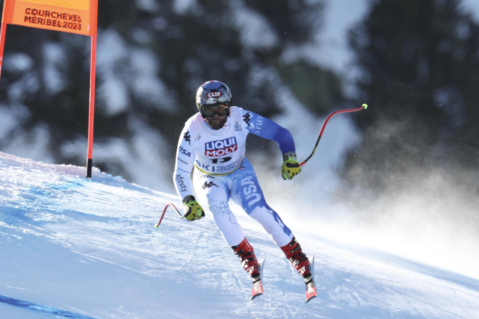 United States' Travis Ganong speeds down the course during the alpine ski, men's World Championship downhill, in Courchevel, France, Sunday, Feb. 12, 2023. (AP Photo/Alessandro Trovati)