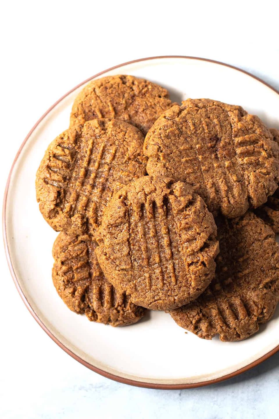 <p>This one-bowl recipe will satisfy your cookie cravings without the hard work. You can swap in any nut (or seed) butter you like. </p><p><strong>Get the recipe at <a href="https://lexiscleankitchen.com/3-ingredient-almond-butter-cookies/" rel="nofollow noopener" target="_blank" data-ylk="slk:Lexi’s Clean Kitchen;elm:context_link;itc:0;sec:content-canvas" class="link ">Lexi’s Clean Kitchen</a>.</strong></p>