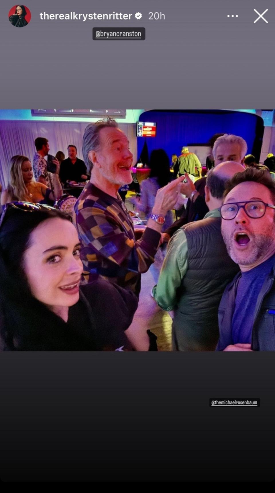 Krysten Ritter posing with Bryan Cranston and Michael Rosenbaum