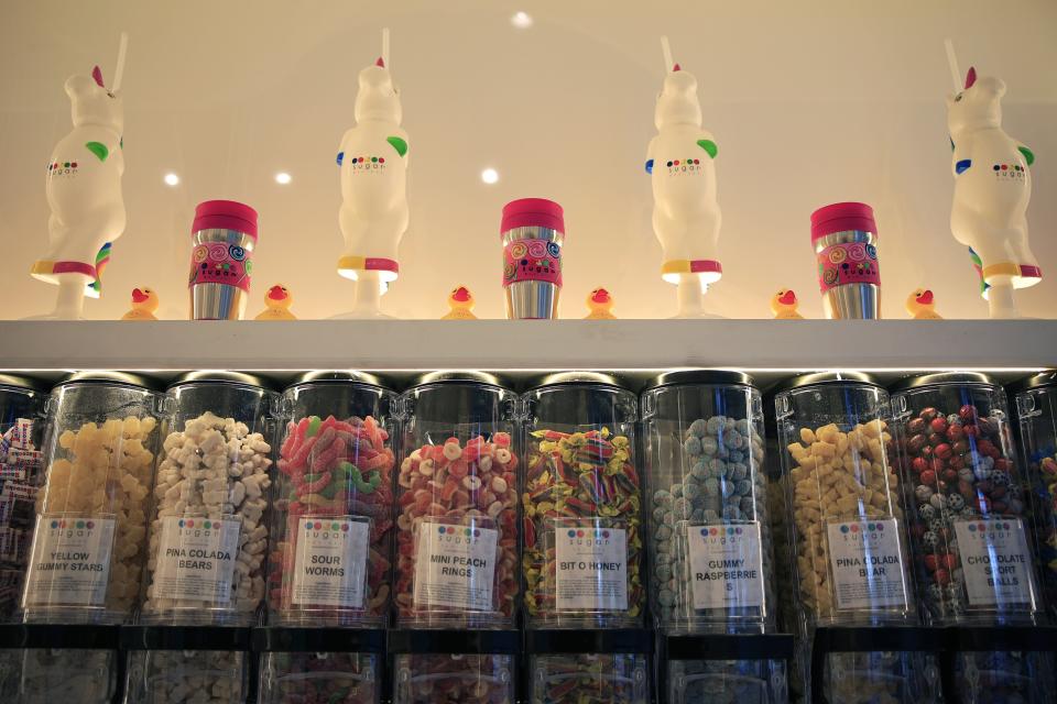 Bulk candy sits on display waiting to be sold at Sugar Factory American Brasserie at 4910 Big Island Drive at The Markets at St. Johns in Jacksonville. The new dining spot opened Tuesday.