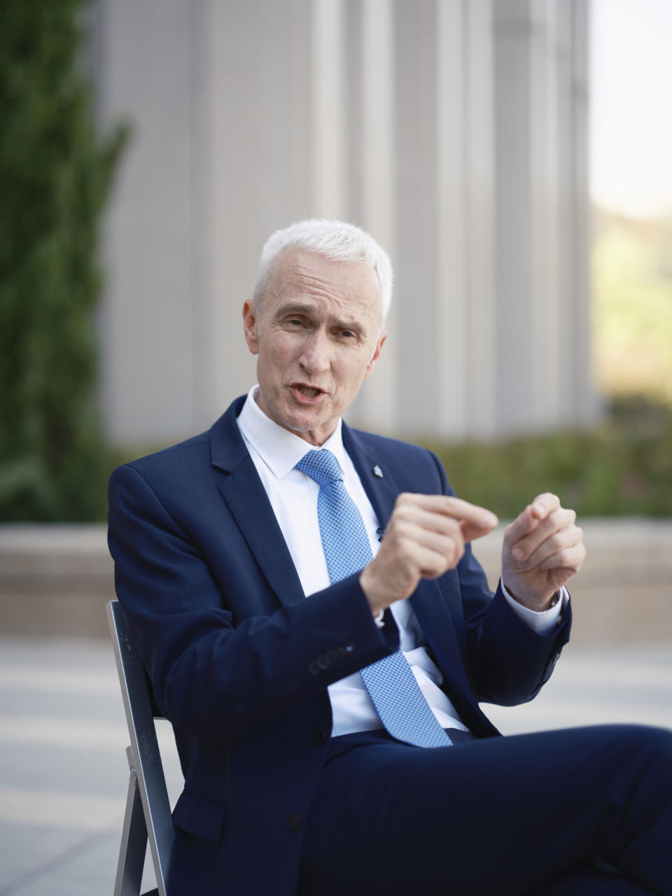 Interpol Secretary General Jurgen Stock talks to journalists during an interview outside the Interpol headquarters in Lyon, central France, Tuesday, Sept. 5, 2023. Jürgen Stock, who was appointed to the post in 2014 is beginning his last year in office. Interpol, which was founded in 1923, is celebrating its 100th anniversary this month. (AP Photo/Laurent Cipriani)