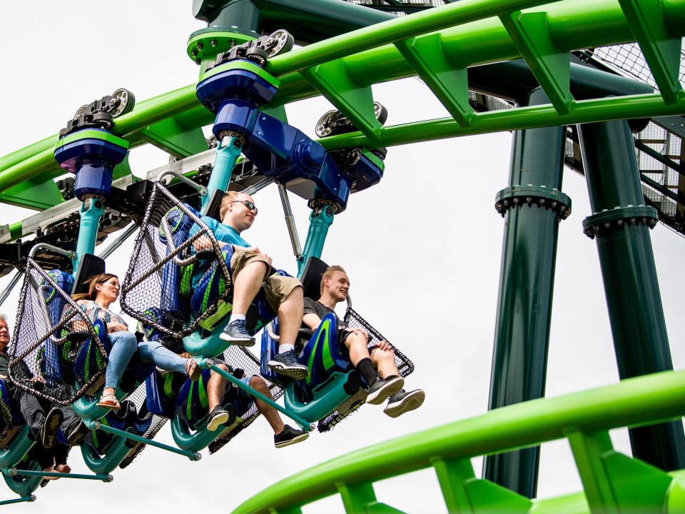 Guests ride The Dragonflier roller coaster during the grand opening of Dollywood's new Wildwood Grove expansion on Friday, May 10, 2019.