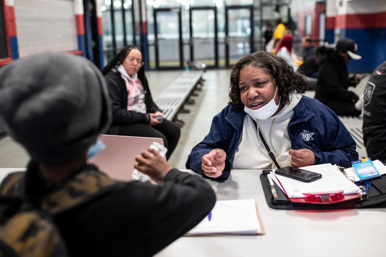 Cynthia Wardlaw talks to Quenton Sims, 7, as he checks in before practice at the Jack Adams Memorial Arena in Detroit on Wednesday, May 4, 2022.