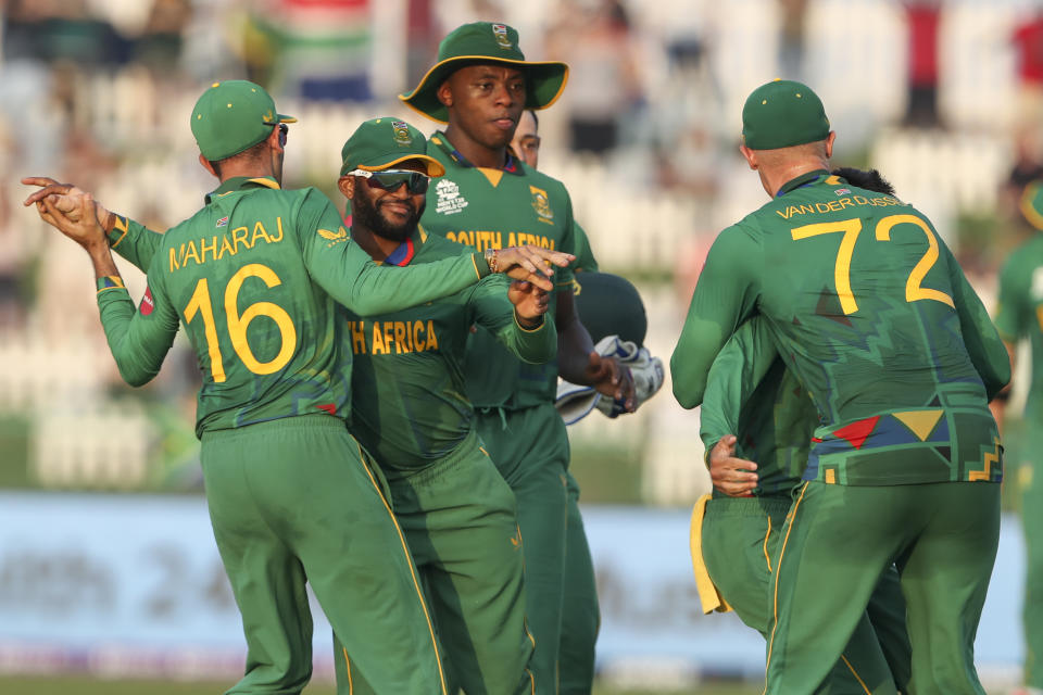 South African players celebrate the dismissal of Australia's Glenn Maxwell during the Cricket Twenty20 World Cup match between South Africa and Australia in Abu Dhabi, UAE, Saturday, Oct. 23, 2021. (AP Photo/Kamran Jebreili)