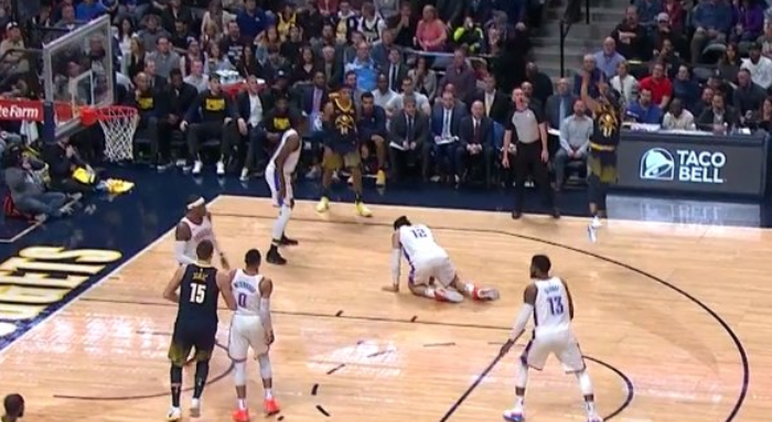 Jamal Murray drops Steven Adams, refs begin the 10-count.(Screenshot)