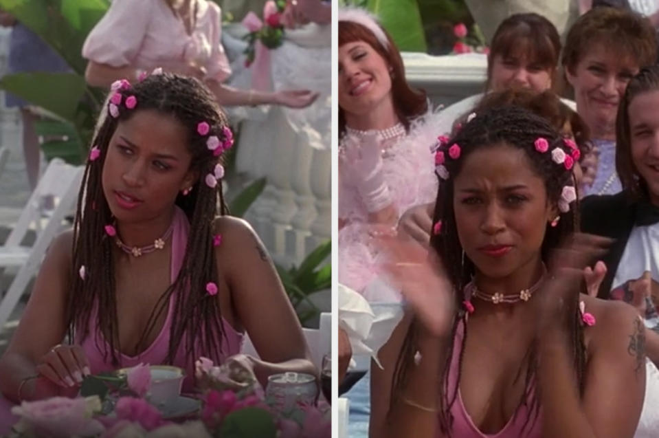 Dionne wears a pink gown and pink floral hair accessories at Mr. Hall and Miss Geist's wedding