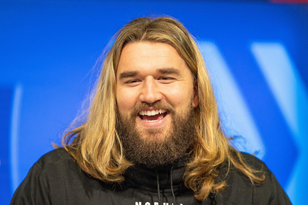 Colorado State tight end Dallin Holker talks with the media during the 2024 NFL Combine in February.