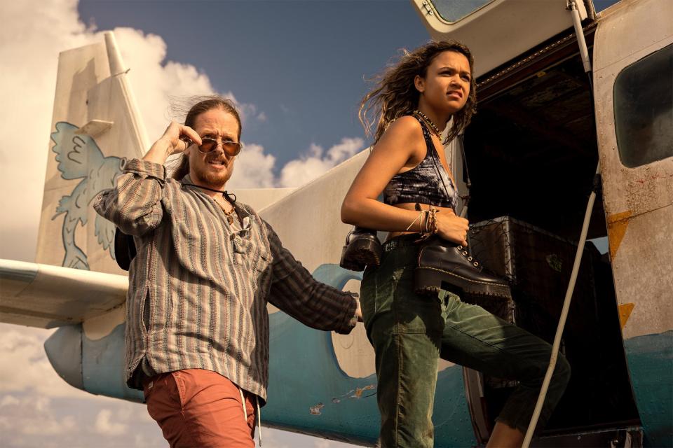 Outer Banks. (L to R) Kraig Dane as Portis, Madison Bailey as Kiara in episode 301 of Outer Banks. Cr. Jackson Lee Davis/Netflix © 2023