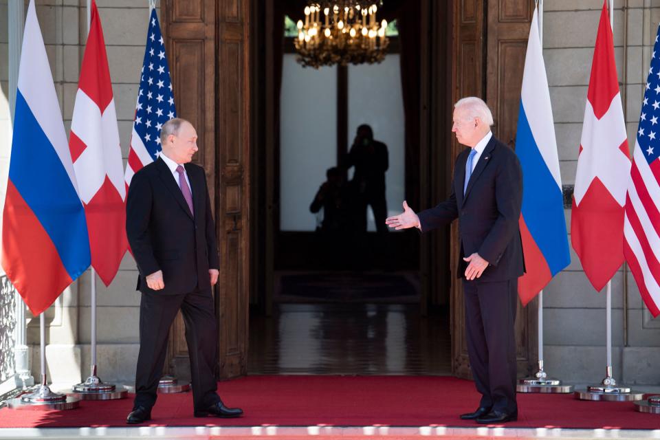 US President Joe Biden prepares to shake hands with Russian President Vladimir Putin prior to the US-Russia summit at the Villa La Grange, in Geneva on June 16, 2021. (Brendan Smialowski /AFP via Getty Images)