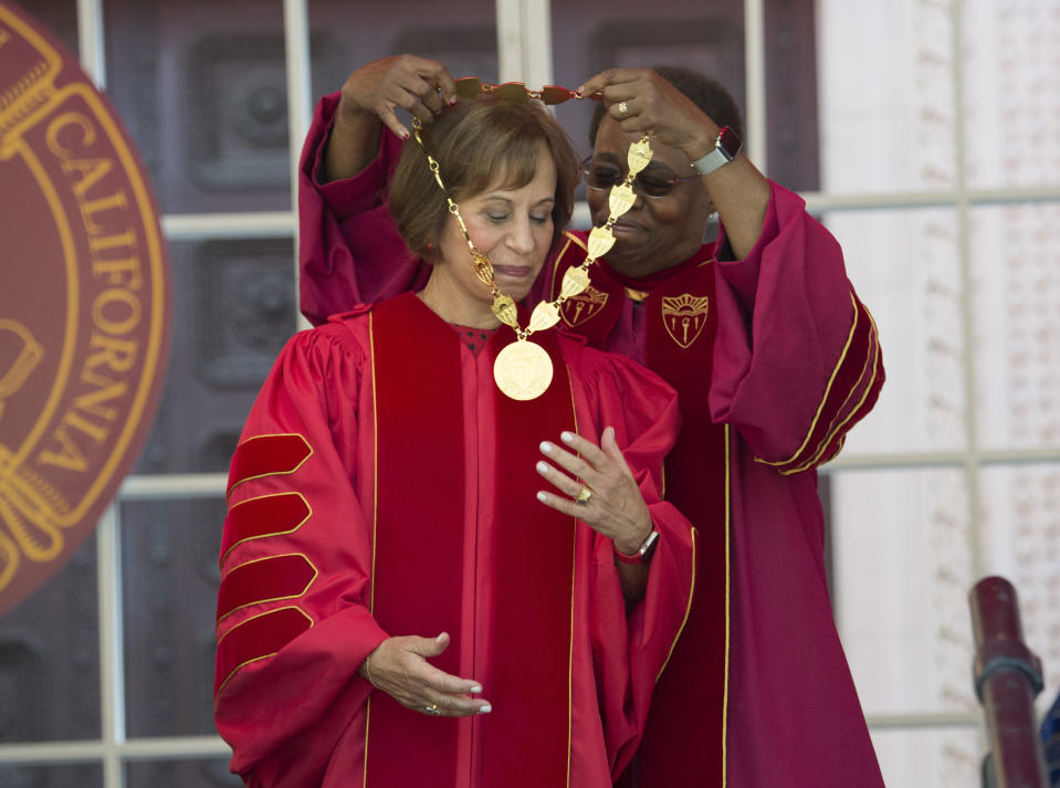 IMAGE DISTRIBUTED FOR USC - Interim USC President Wanda Austin, right, bestows the Medal of Office during Carol L. Folt's inauguration ceremony on Friday Sept. 20, 2019 in Los Angeles. (Phil McCarten/AP Images for USC)