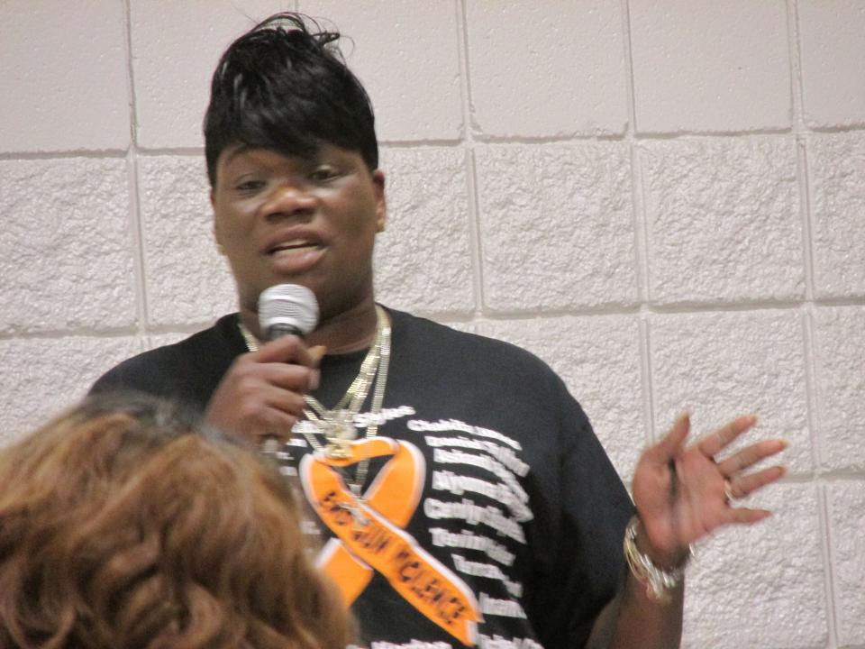 Demetria "Dee" Murphy speaks during a community forum discussion about gun violence Tuesday, June 7, 2022, at the Kiwanis Recreation Center in Fayetteville.