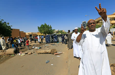 A Sudanese man gestures near the home of a demonstrator who died of a gunshot wound sustained during anti-government protests in Khartoum, Sudan January 18, 2019. REUTERS/Mohamed Nureldin Abdallah