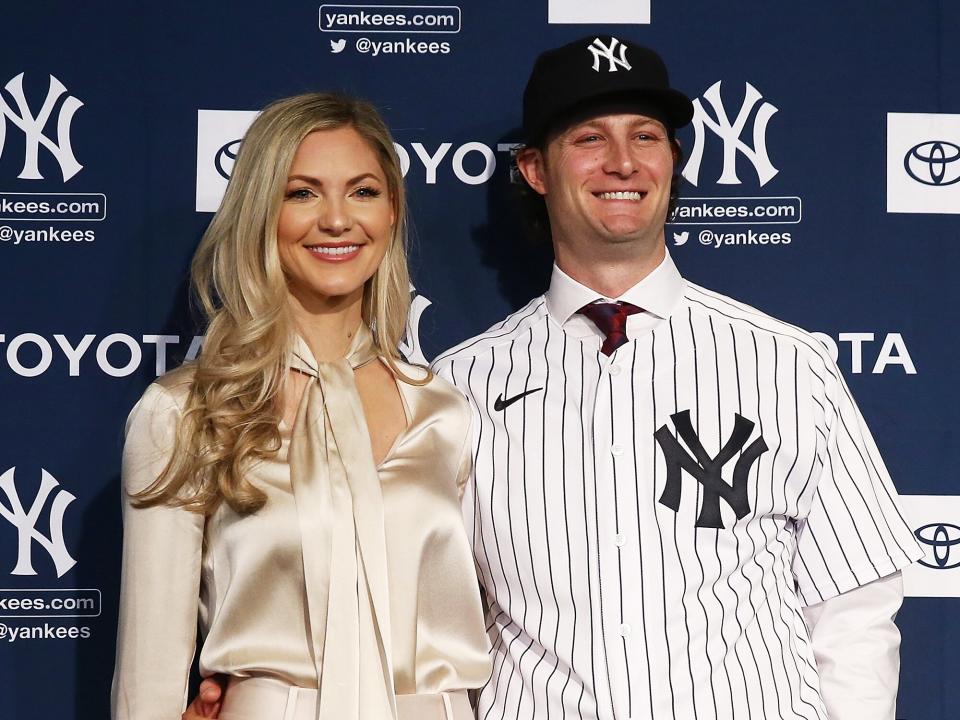 Gerrit Cole and his wife Amy Cole pose for a photo at Yankee Stadium during a press conference at Yankee Stadium on December 18, 2019 in New York City