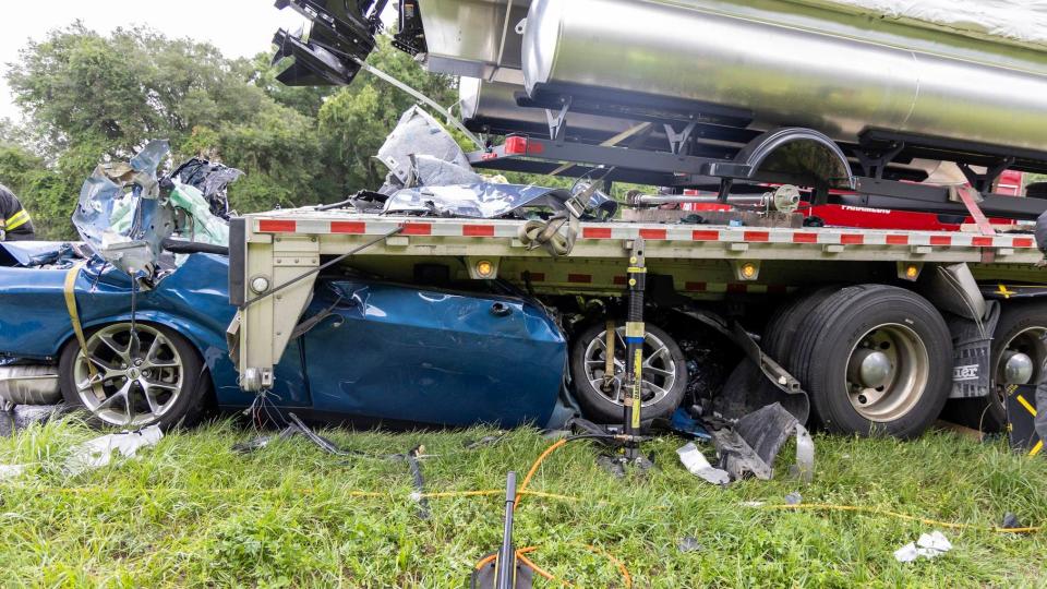 Dodge Challenger Slams Into A Tractor-Trailer