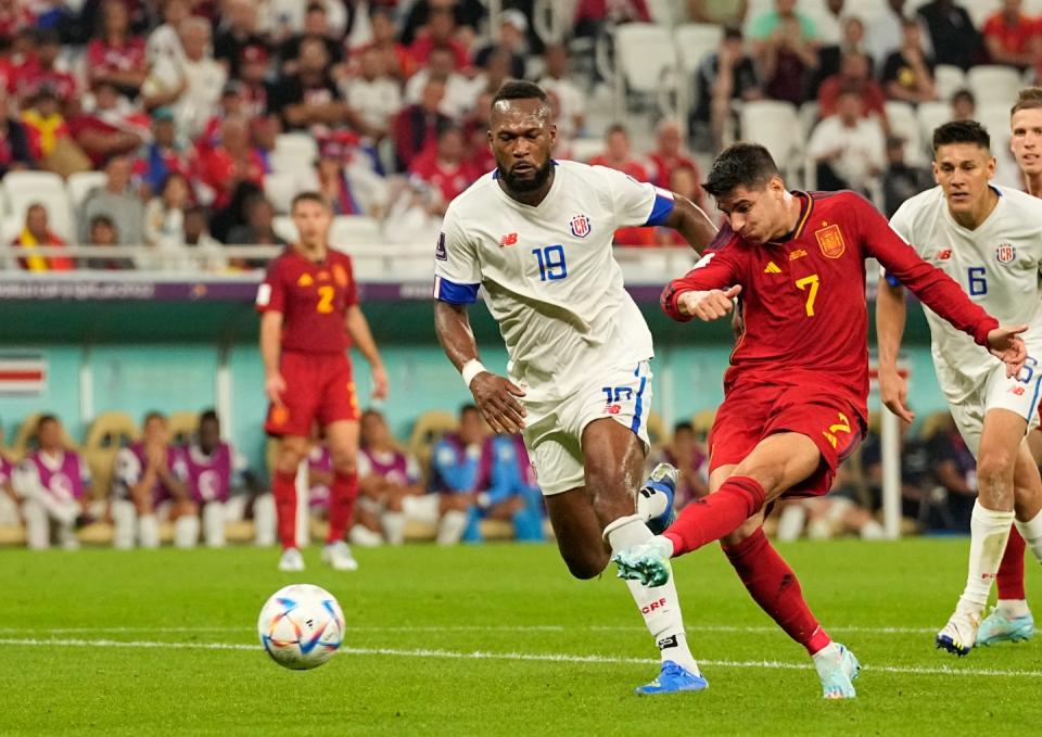 Spain's Alvaro Morata, right, scores his side's seventh goal during the World Cup group E football match between Spain and Costa Rica, at the Al Thumama Stadium in Doha, Qatar, Wednesday, Nov. 23, 2022. (AP Photo/Pavel Golovkin)