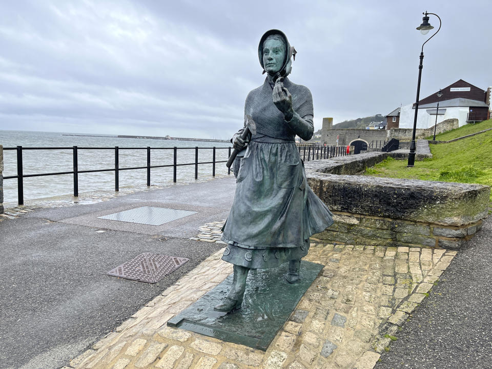 A statue of Mary Anning, who helped create the science of paleontology., appears in Lyme Regis, southern England, on April 22, 2023. (Steve Wartenberg via AP)